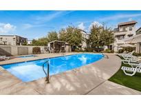 Community pool and lounge area, perfect for relaxing and entertaining under the desert sun at 300 N Gila Springs Blvd # 160, Chandler, AZ 85226