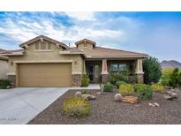 Charming single-Gathering home featuring a two-car garage and professionally landscaped front yard at 5253 W Maya Way, Phoenix, AZ 85083