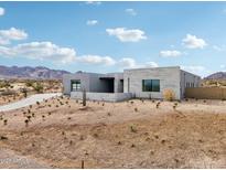 Stunning modern home showcasing a unique architectural style and desert landscaping at 13116 E Desert Holly Dr, Scottsdale, AZ 85255