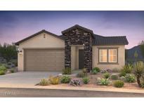 Charming single-story home featuring stone accents, desert landscaping, and a two-car garage at 18148 E Tiffany Dr, Queen Creek, AZ 85142