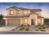 Inviting two-story home featuring a neutral color palette, tile roof, and charming desert landscaping at 18150 E Colt Dr, Queen Creek, AZ 85142