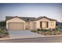 Charming single-story home featuring a two-car garage, beautiful landscaping, and a neutral color palette at 18167 E Colt Dr, Queen Creek, AZ 85142