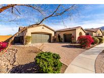 Charming single-story home featuring a brick driveway, two-car garage, and well-maintained landscaping at 9013 S 15Th Way, Phoenix, AZ 85042