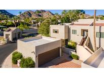 A modern two-story home with a private garage and desert landscaping in a beautiful neighborhood at 6229 N 30Th Way, Phoenix, AZ 85016