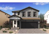 Charming two-story home featuring modern farmhouse design, two car garage, and inviting front porch at 7976 W Griswold Rd, Peoria, AZ 85345