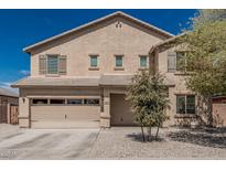 Charming two-story home featuring a neutral color scheme and a two-car garage at 25420 W Park Ave, Buckeye, AZ 85326