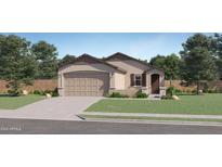 Charming single-story home with a two-car garage, manicured lawn, and welcoming front entrance at 14968 W Hackamore Dr, Surprise, AZ 85387