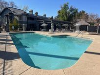 Large community swimming pool with lounge seating at 255 S Kyrene Rd # 115, Chandler, AZ 85226