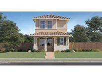Two-story home with stucco siding, tile roof, well-manicured lawn, and covered front porch at 2942 N 98Th Ln, Phoenix, AZ 85037