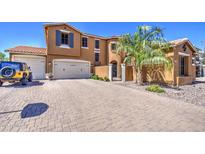 Attractive two-story home with a brick driveway, well-manicured landscaping and a two-car garage at 3016 N Glenview --, Mesa, AZ 85213