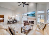 Elegant dining room features a chandelier, open floor plan and lots of natural light at 9155 N 107Th St, Scottsdale, AZ 85258