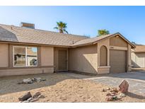 Charming single-story home with desert landscaping and a cozy, inviting entrance at 1841 E Kings Ave, Phoenix, AZ 85022