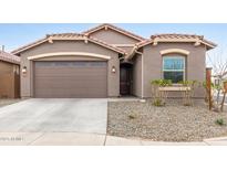 Charming single-story home featuring a two-car garage and a well-maintained front yard at 2235 W Park St, Phoenix, AZ 85041