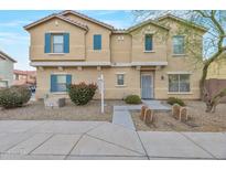 Charming two-story home featuring blue shutters and a well-maintained front yard at 9621 N 82Nd Ln, Peoria, AZ 85345