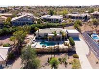 Stunning aerial view of the home with a private pool and lush landscaping at 15783 E Primrose Dr, Fountain Hills, AZ 85268