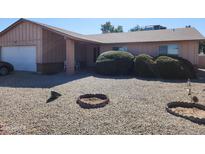 Charming single-story home with neutral tones and drought-resistant landscaping for easy maintenance at 2839 W Villa Maria Dr, Phoenix, AZ 85053