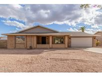 Charming single-story brick home with a well-maintained front yard and inviting entrance at 1713 E Westchester Dr, Tempe, AZ 85283