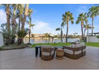 Outdoor patio area with lake views and comfortable seating at 1700 E Lakeside Dr # 16, Gilbert, AZ 85234