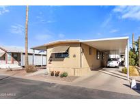 Charming single-story home with covered parking and well-maintained landscaping at 7807 E Main St # Cc-85, Mesa, AZ 85207