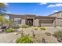 Charming home featuring low-maintenance desert landscaping, with rock and decorative elements at 34014 N 43Rd St, Cave Creek, AZ 85331