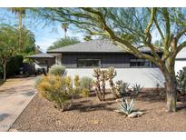 Charming home featuring desert landscaping, updated paint and modern architectural design at 4530 N 9Th Ave, Phoenix, AZ 85013