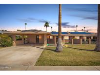 Charming single-story home with desert landscaping, covered parking and solar panels in a quiet neighborhood at 13621 N Emberwood Dr, Sun City, AZ 85351