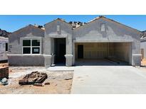 Unfinished exterior of single-story home with stucco and large garage and entryway at 28228 N Nealite Dr, San Tan Valley, AZ 85143