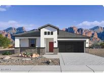 Charming single-Gathering home featuring a modern elevation, neutral color palette, and a two car garage at 10039 S 23Rd Dr, Phoenix, AZ 85041