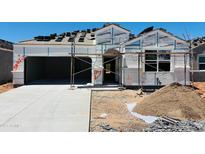 New construction featuring a modern design, spacious garage, and durable roofing tiles for lasting curb appeal at 28216 N Nealite Dr, San Tan Valley, AZ 85143