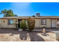 Charming home featuring a tidy front yard and a welcoming facade at 3120 N 67Th Ln # 31, Phoenix, AZ 85033