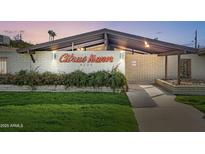 Inviting Citrus Manor entrance featuring well-manicured lawn, a striking brick facade, and clear signage at 4203 N 36Th St # 23, Phoenix, AZ 85018