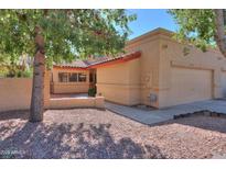 Charming single-story home featuring a two-car garage and a well-maintained front yard at 4843 W Del Rio St, Chandler, AZ 85226