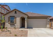 Charming single story home with a tile roof and a two car garage at 3906 N 103Rd Ave, Avondale, AZ 85392