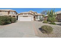 Charming single-story home with well-maintained landscaping and a two-car garage at 3804 E Encinas Ave, Gilbert, AZ 85234