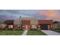 Modern home featuring a sleek, minimalist design and well-manicured lawn at 86Xx E Stagecoach Pass # 5, Carefree, AZ 85377