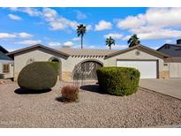 Charming single-story home featuring desert landscaping and a cozy courtyard entry at 1812 W Curry Drive Dr, Chandler, AZ 85224