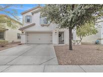 Charming two-story home with a well-manicured lawn and a two-car garage at 3533 E Harwell Rd, Gilbert, AZ 85234