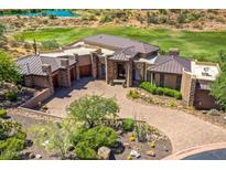 Overhead shot of the home featuring desert landscaping and a paved driveway at 10224 N Azure Vista Trl, Fountain Hills, AZ 85268