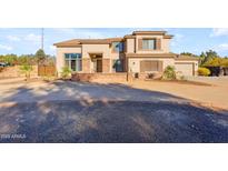 Stunning two-story home featuring stylish architecture, a well-manicured landscape, and a welcoming entrance at 3707 N 188Th Ave, Litchfield Park, AZ 85340