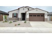 Charming single-story home featuring a well-maintained yard and a two-car garage at 37342 W San Clemente St, Maricopa, AZ 85138