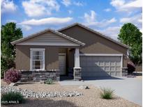 Charming single-story home with a stone-accented facade, a two-car garage, and low-maintenance landscaping at 13142 E Verbina Ln, Florence, AZ 85132