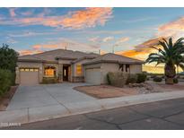 Charming single-story home with a well-manicured yard and a spacious driveway, perfect for suburban living at 6993 S Roger Way, Chandler, AZ 85249