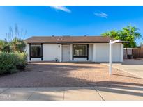 Charming single-story home featuring low-maintenance landscaping and an attached one-car garage at 2336 W Plata Ave, Mesa, AZ 85202