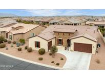 Stunning single-Gathering home featuring desert landscaping and stone accents at 41622 W Summer Sun Ln, Maricopa, AZ 85138