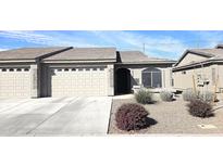 Charming single-story home featuring a two-car garage and well-maintained landscaping at 3117 S Signal Butte Rd # 480, Mesa, AZ 85212