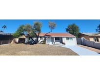 Charming single-story home featuring desert landscaping and a painted driveway at 4508 E Alta Vista Rd, Phoenix, AZ 85042