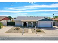 Charming single-story home with desert landscaping, covered porch and attached garage at 4929 W Christy Dr, Glendale, AZ 85304