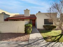 Charming single-story home featuring a red tile roof, neutral stucco, and inviting front entryway at 633 W Southern Ave # 1115, Tempe, AZ 85282