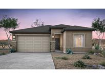 Charming single-story home featuring a neutral color palette, desert landscaping, and attached two-car garage at 16515 N Comet Trl, Maricopa, AZ 85138