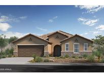 Charming single-story home featuring a two-car garage, stone accents and a tile roof at 17131 W Oberlin Way, Surprise, AZ 85387